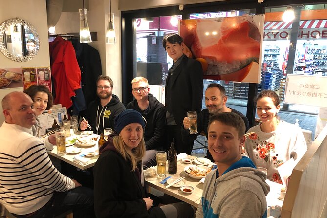 Eat and Drink Like a Local: Tokyo Ueno Food Tour-Taverns&Ramen - Walking through Ameya Yokocho