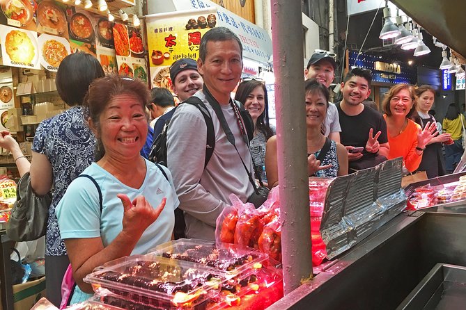 Eat, Drink & Cycle: Osaka Foodie Bike Tour - Starting under Tsutenkaku and fitting your bike