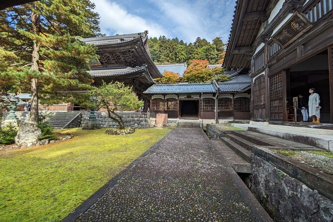 Full Day Tour Eiheiji Buddhist Temple and Fukui City Castle Town - Fukui Castle’s walls, moat, and modern offices