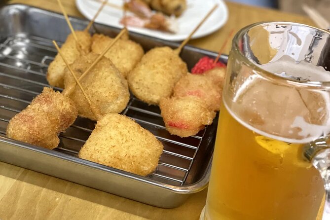 Hidden Osaka - Yukaku Red Light Tour & Culinary Adventure - Shinsekai gives the evening a lighter turn