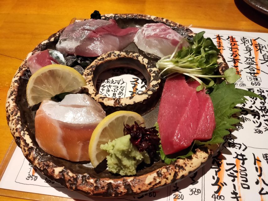 Hiroshima: Food and Culture Guided Walking Tour with Dinner - Nagarekawa Dori after dark