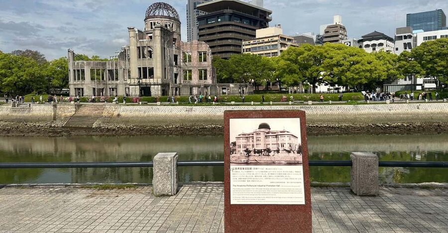 Hiroshima; Hiroshima Peace Memorial Museum and Castle Tour - Reading Peace Memorial Park beyond the photographs
