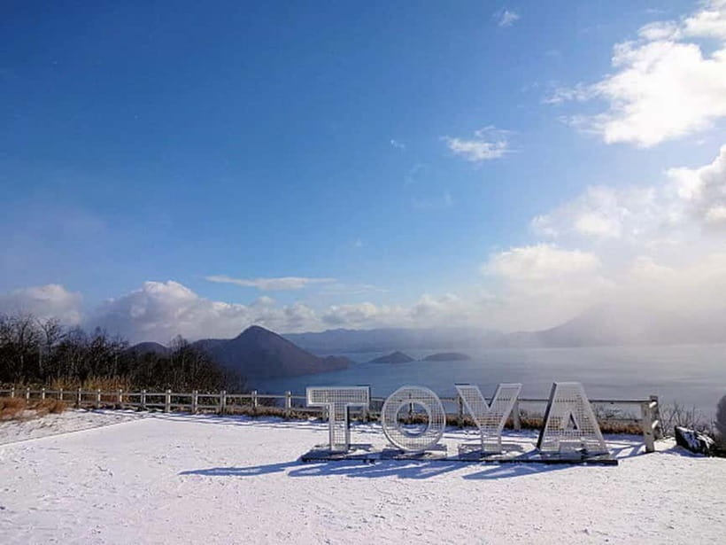 Hokkaido Tour:Sapporo to Noboribetsu, Lake Toya,Ice Festival - Silo Observatory and Lake Toya from above