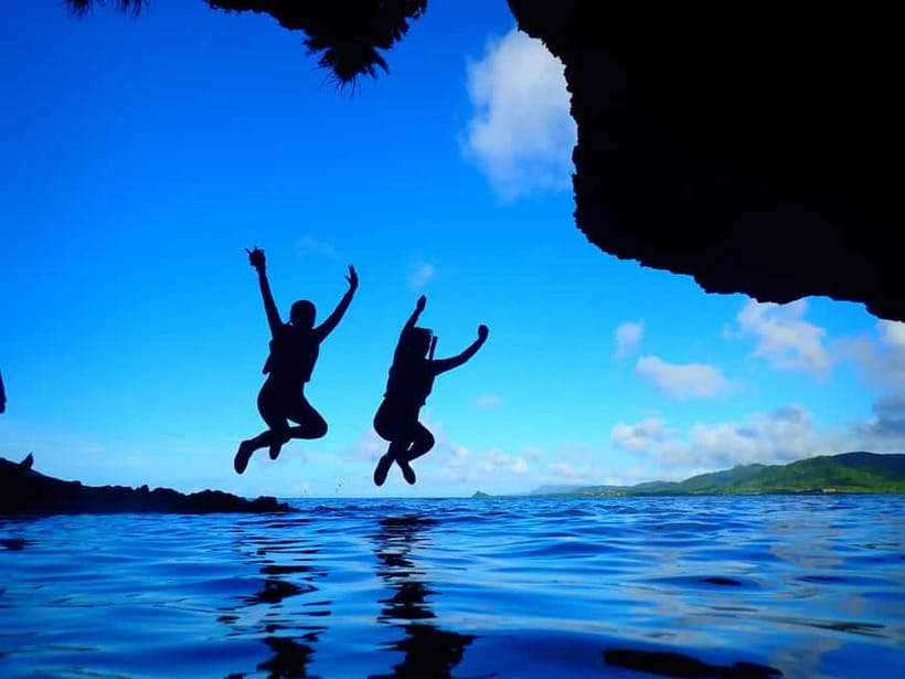 Ishigaki Island: Blue Cave Exploration & Snorkeling Tour - Walking into the cave and entering the water