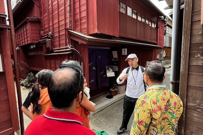 Kanazawa Ninja Temple Half Day E-bike tour - Walking through Kanazawa Castle Park