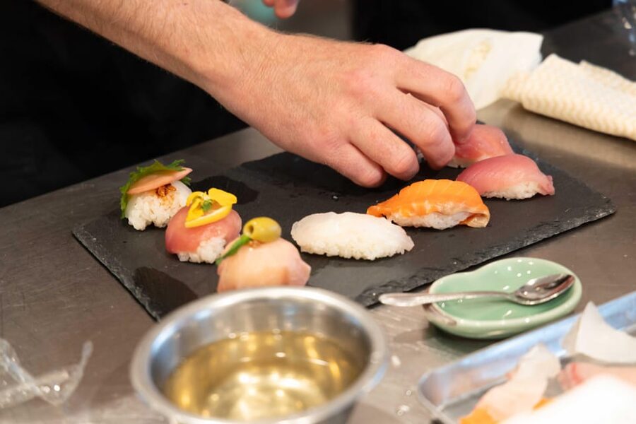 Kyoto: Enjoy Sushi & Market Tour! Best for Family & Couple! - Sitting Down to Eat What You Made