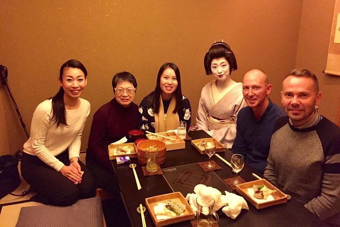 Kyoto Evening Gion Food Tour Including Kaiseki Dinner - Crossing the Kamogawa and reading the riverfront