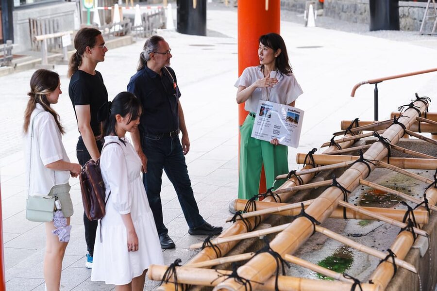 Kyoto: Fushimi Inari Taisha Shrine Walking Tour with Guide - Walking through Fushimi Inari’s orange gates