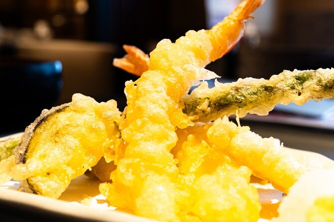 Kyoto: Gion Local Food Tour (Taste 15 Dishes) - A walk toward Yasaka Shrine while dinner continues