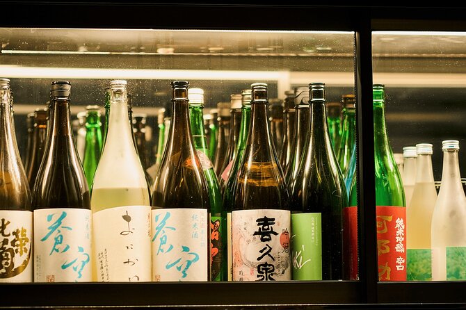 Kyoto: Guided Food Tour with 12 Dishes & 3 Drinks - Pontocho after dark, with 12 dishes on the table