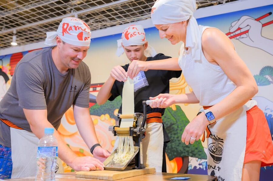 Kyoto: Ramen Cooking Class at a Ramen Factory with Souvenir - Getting ready with the apron and headscarf