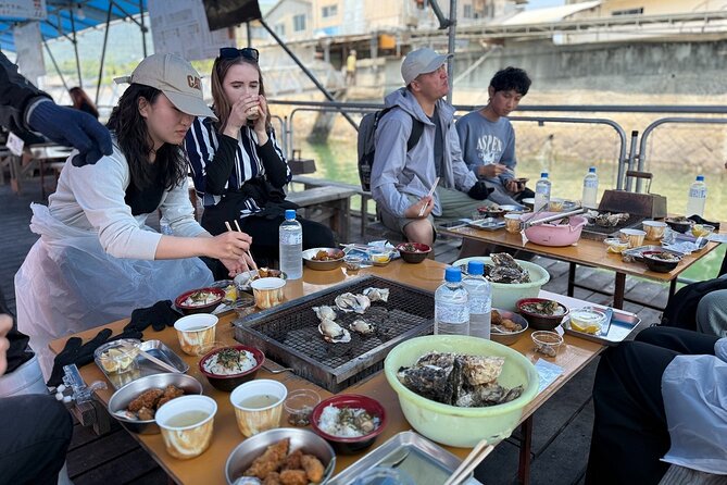 Miyajima Guided Tour and Fresh Oyster Farm Tour - Seeing the Great Torii from the water