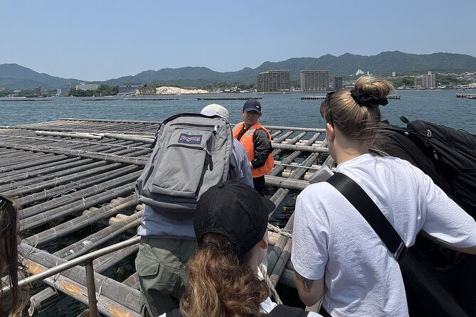 Miyajima Guided Tour and Fresh Oyster Farm Tour - One hour on Omotesando Shopping Street