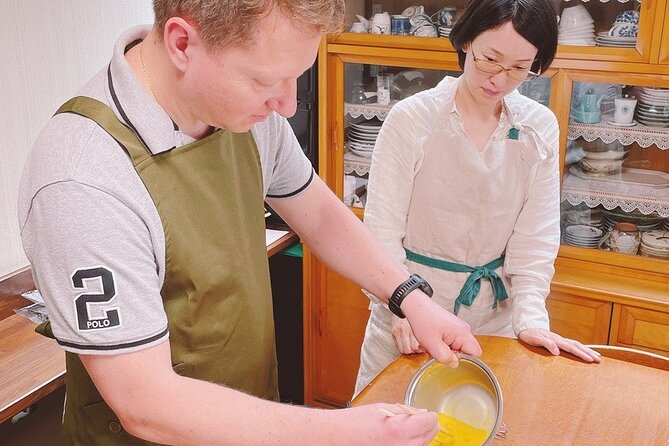 Near Fushimiinari: Kyoto Home Cooking Class & Supermarket tour - Learning dashi before the main cooking begins