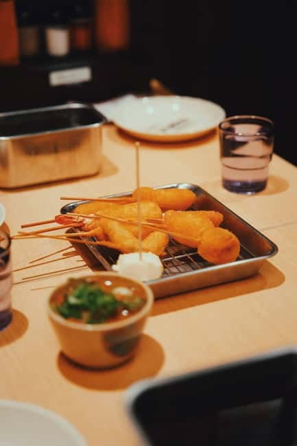 Osaka: 2-Hour Local Street Food Tour – Dotonbori & Namba - What the guides add to the meal