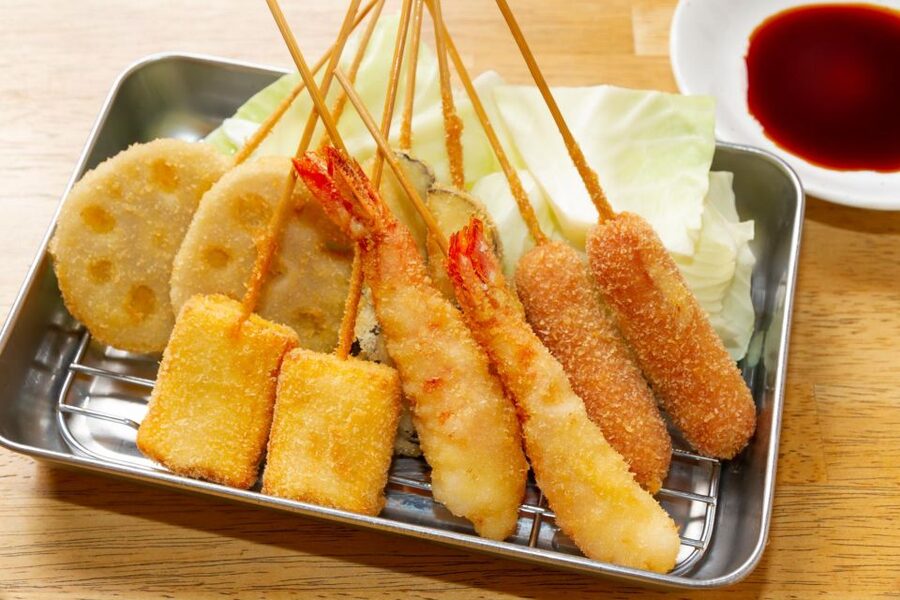 Osaka: Bar-Hopping Night Tour in Namba - First stop: kushikatsu, beer, sake, and shochu