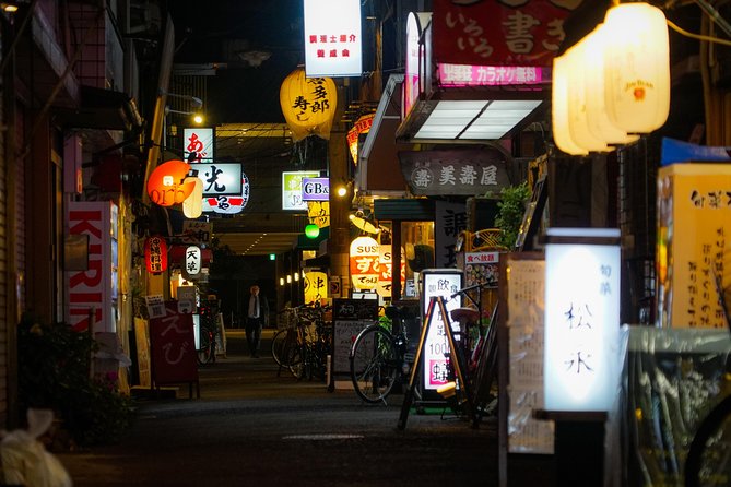 Osaka Bar Hopping Night Walking Tour in Namba (3 bars, 6 tastes) - The first hour: food, drinks, and three local stops