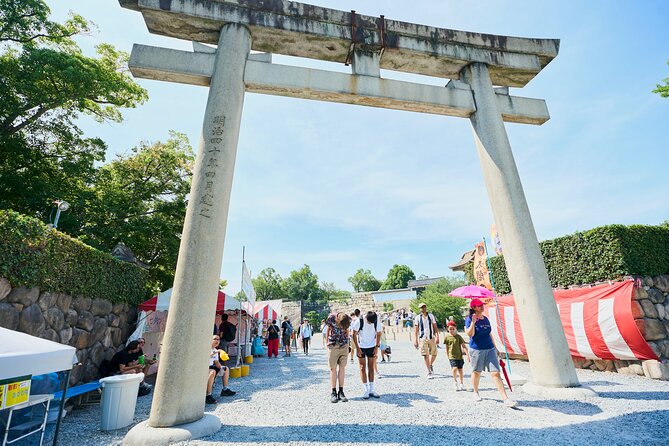 Osaka Castle Walking Tour and Castle Tower Admission - Inside the main keep and up to the city view