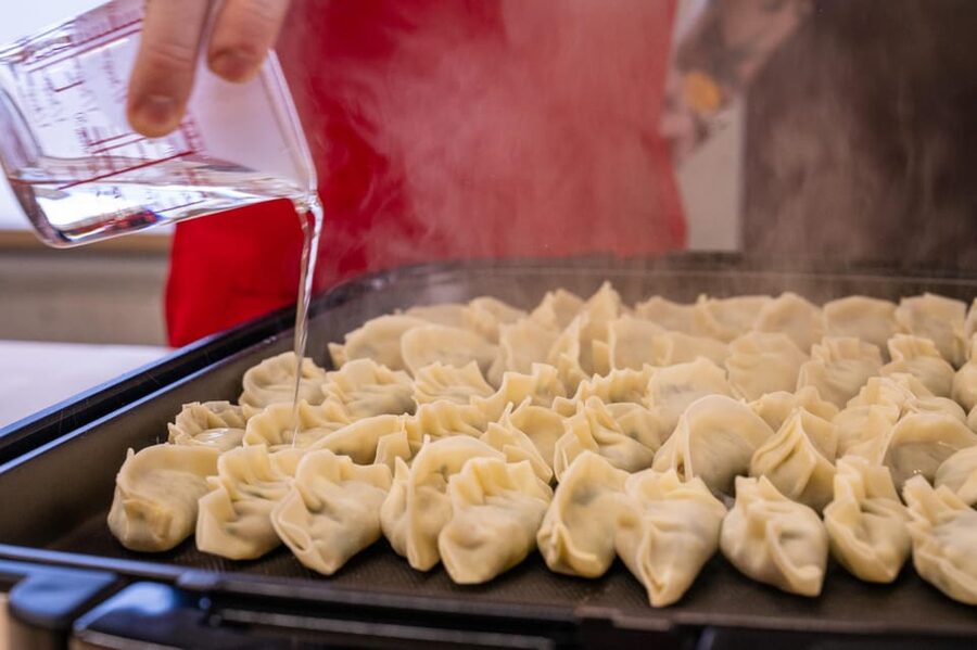 Osaka: Cooking Class & Sake Tasting with Local Market Visit - Cooking niku-sui, Osaka’s lesser-known soup