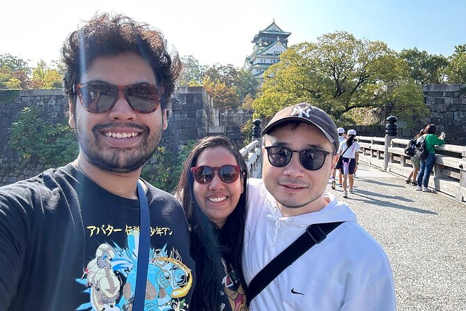 Osaka E-Bike Tour with a Local Guide - Osaka Castle through its broad park