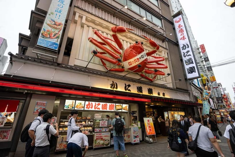 Osaka: Food Tour Kuromon Market & Dotonbori with Guide - Okonomiyaki and kushikatsu at Kushikatsu Yokozuna