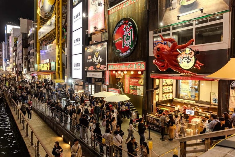 Osaka: Food Tour Kuromon Market & Dotonbori with Guide - A custard tart to finish the food stops