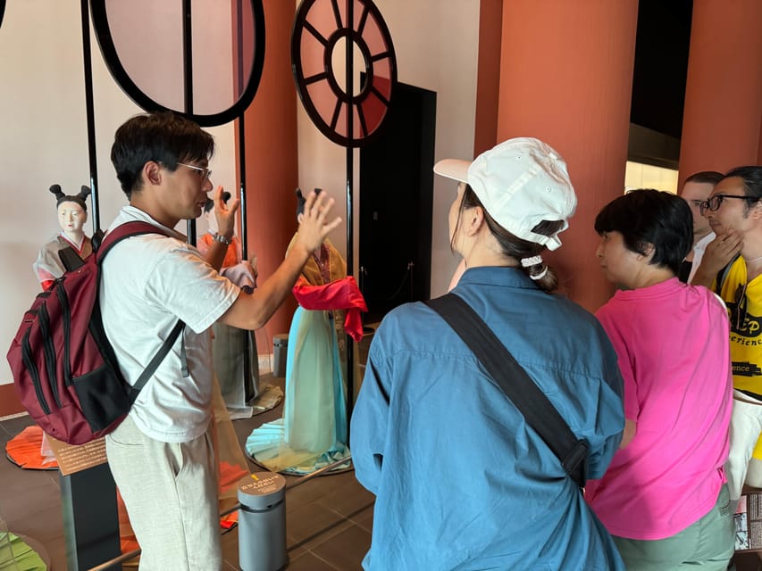 Osaka: Osaka Castle & Historical Museum Guided Tour - Walking into Osaka Castle Park