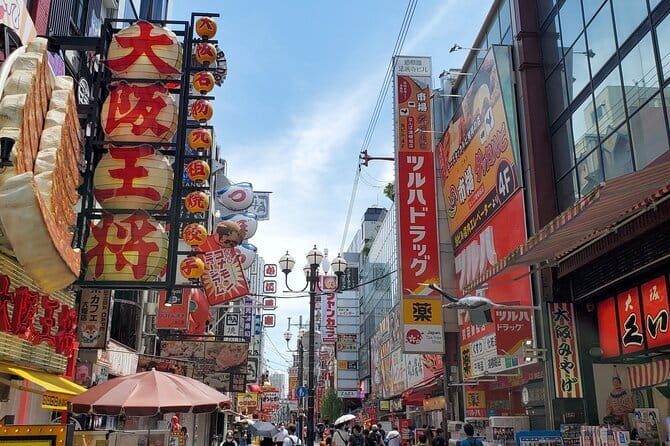 Osaka: Walking Tour to Local Gems, Food & Culture - Moving through the first local stops