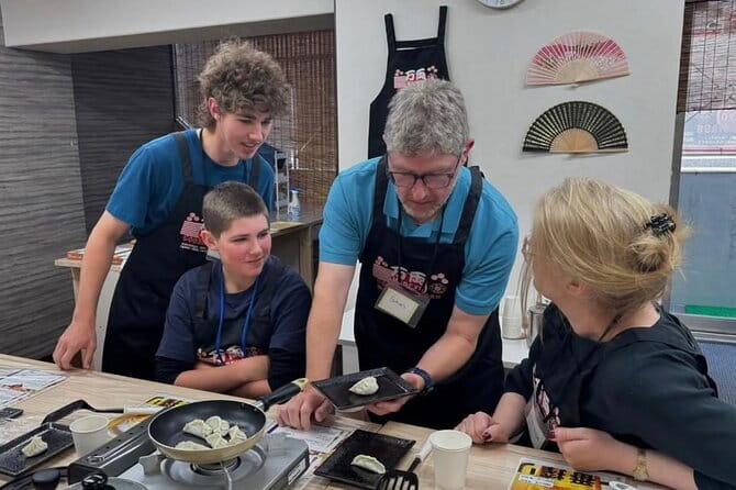 Ramen Gyoza Onigiri Japanese Cooking Class in Kyoto - Folding gyoza and shaping onigiri
