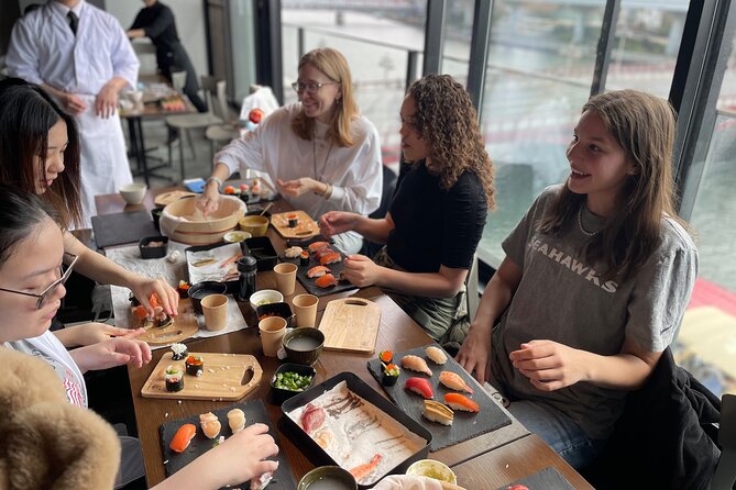 Sushi Making Tokyo Roll and Authentic Japanese Sushi Class - Shaping authentic nigiri by hand