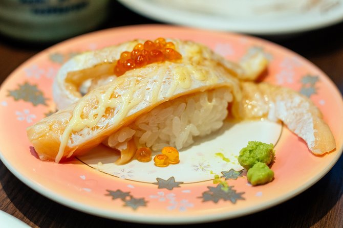 The 10 Tastings of Tokyo With Locals: Private Street Food Tour - Sushi and sake show two sides of Japanese eating
