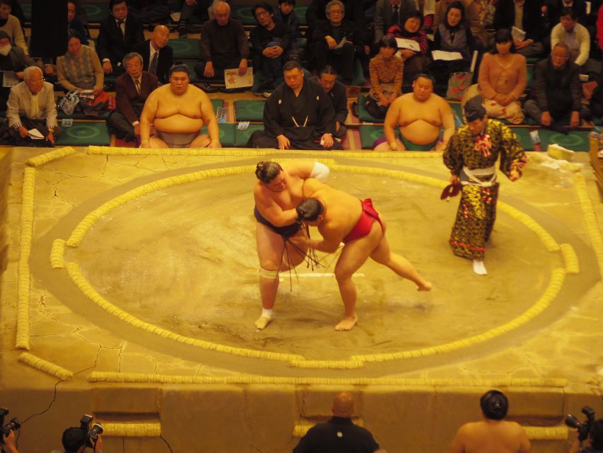 Tokyo: Sumo Tournament Tour with Chair Seat Tickets - Sumo supporter kits and local crowd energy
