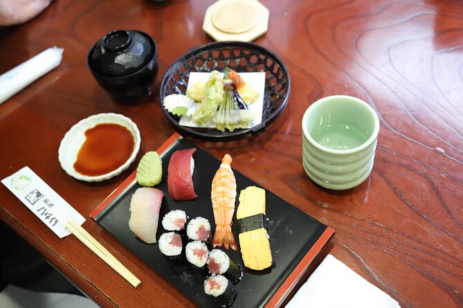 Tsukiji Fish Market Guided Tour and Sushi Making with Pro Chef - Eating the sushi you make