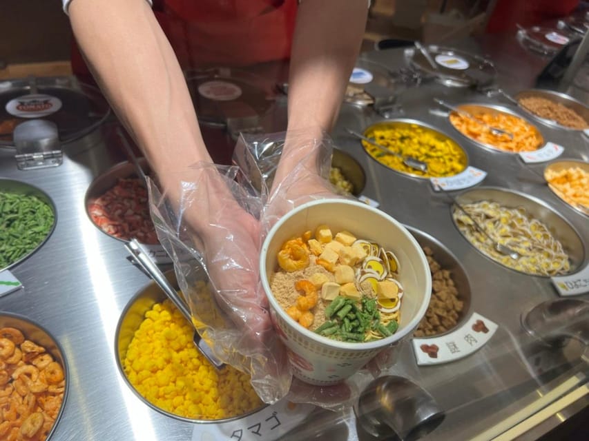Yokohama: Guided Cup Noodles Museum Tour & Make Your Own Cup - Meeting your guide at the museum entrance